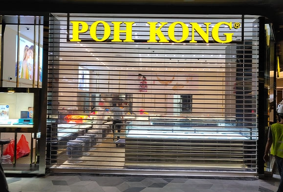 Poh Kong storefront with roller shutter in Malaysia